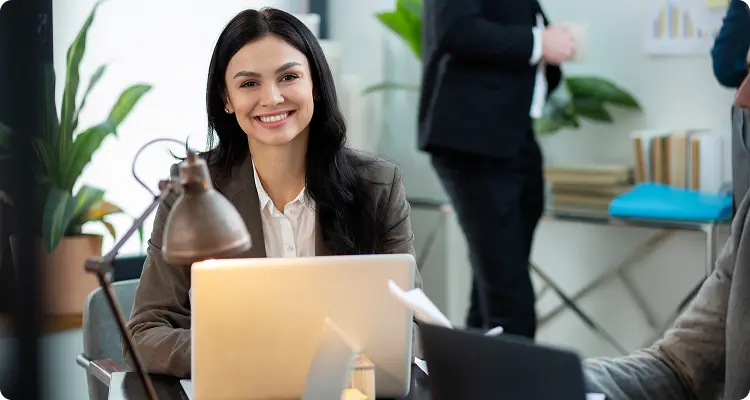 close up smiley woman with laptop
